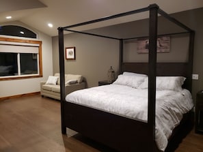 Master bedroom showing  queen sleeper sofa