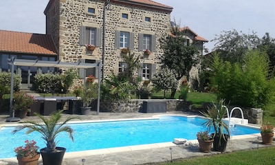 Beautiful  stone house , heated pool,1 hectare of land. Family friendly,local