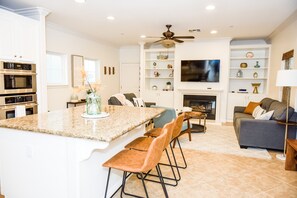 Kitchen and living room great area. Plenty of room to cook, chat, and relax! 