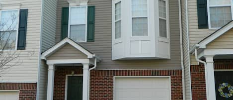 Front of home, including garage and main entry