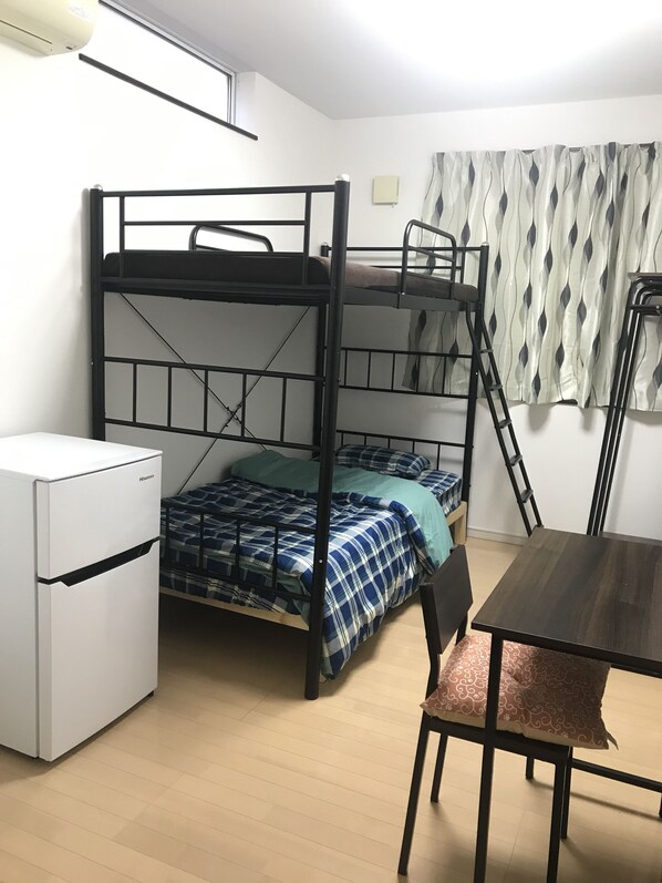 Private bed room 
-Refrigerator
-Table and chair
-Cloth hanger