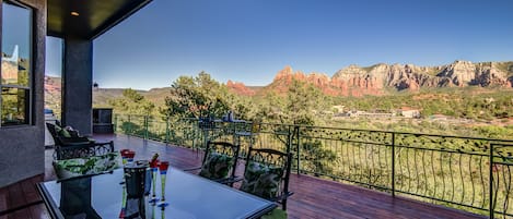 Wrap Around Main Level Deck with Outdoor Dining and Sitting Areas