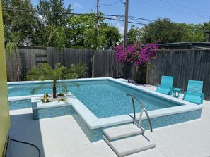 New Swimming Pool! Covered patio, new outdoor furniture, and a new gas grill! 