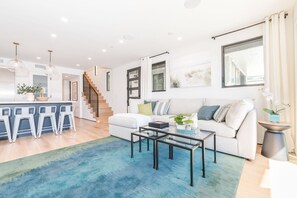 Professionally designed and furnished to reflect the coastal location.
                