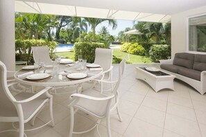 Breezy patio just steps away from pool