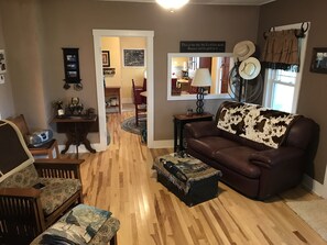 Our living room is cozy, and open to the kitchen.