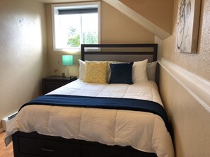 Room #2 Queen size bed, views of Resurrection Bay & Mt. Alice w/blackout shades.