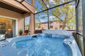 Enjoy Florida sunlight while relaxing in a private hot tub