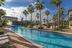 Dive into relaxation at our expansive pool, the largest on 30A, perfect for cooling off and enjoying a refreshing swim