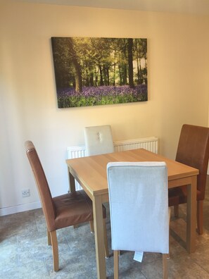 Dining area with extendable table and extra dining chairs available