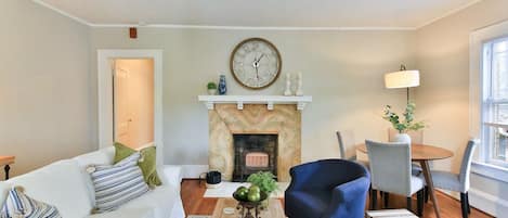 The cozy living room is at the front of the property down the hall from the kitchen but the Fireplace is not for use