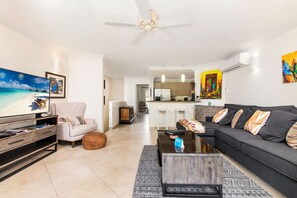 Sapphire Beach 102 - Living Area Looking to Kitchen - Upper Level