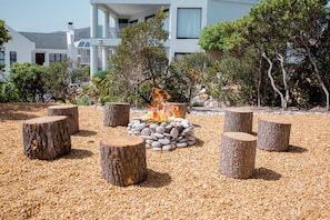 traditional boma fire pit on the street side