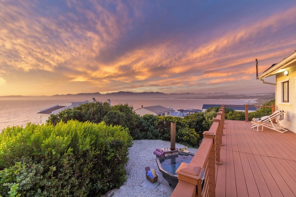 Stunning Ocean and mountain view from the deck, living, and 2 bedrooms