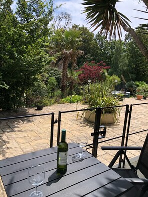 Private south facing veranda overlooking tropical garden and Chine waterfall