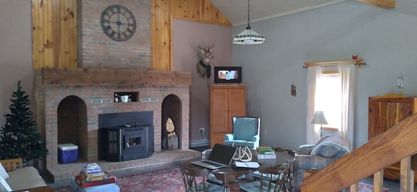 Great Room with cathedral ceiling and corn stove.  