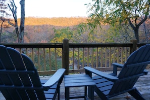 Gorgeous mountain view from the upper level deck Adirondack chairs.  Relax Enjoy