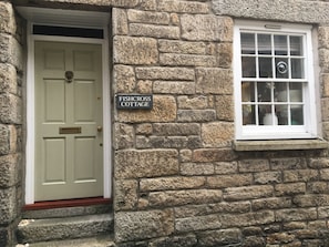 18th Century grade 11 listed Granite cottage. 