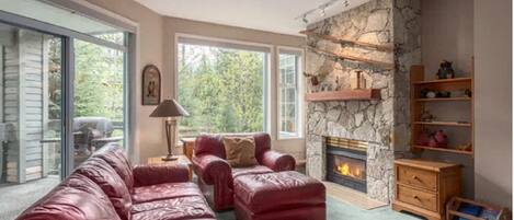 Main living room with Mtn Views and gas fireplace