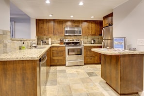 Spacious kitchen with all of the creature comforts of home to cook any meal