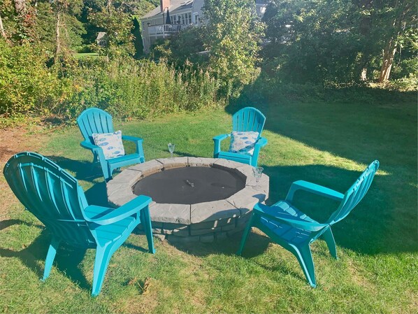 Enjoy the stone fire pit with your favorite libation or roast marshmallows for the kids- 30 Chatham Crest Drive Chatham Cape Cod - New England Vacation Rentals