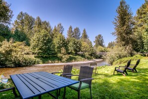 Relaxing in yard by river