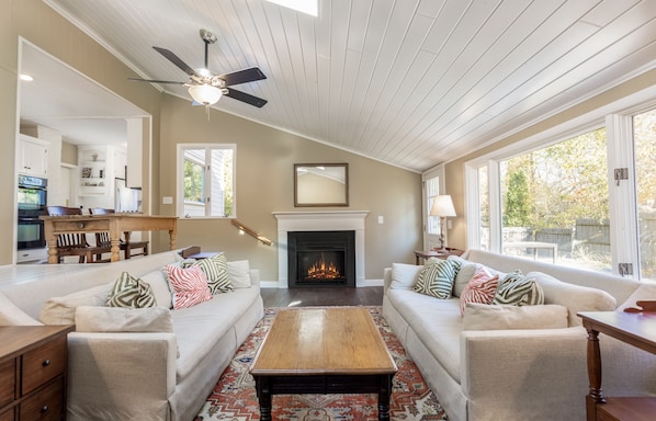 Great Family Room for gathering. Leads to brick patio and fenced-in back yard 