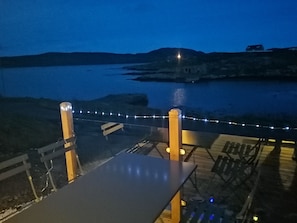 Enjoy the tranquility under the stars by the sea.