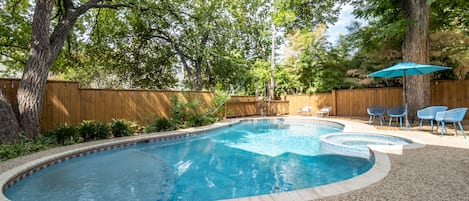 Private pool in spacious backyard