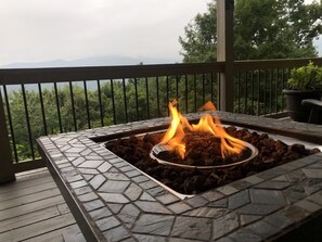 Warm up by the lower deck fire table