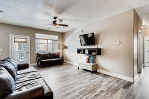 Flat screen TV, comfortable furniture and access to large deck