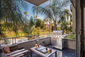 Enjoy the balcony located off the living room. Grill up a feast while taking in the views of Balboa Park.