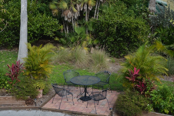 Tropical backyard shared with other guests on property.