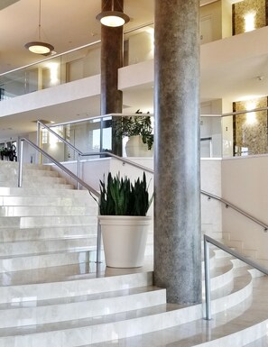 Dramatic two story lobby with 24 hour manned concierge desk