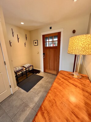 Front hall area- coat closet on the left