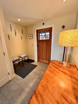 Front hall area- coat closet on the left
