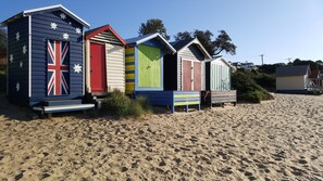 Beach boxes nearby on Shire Hall Beach .