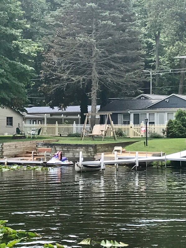 Located right on the channel with a dock for your boat , beautiful view of lake 