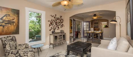 Entry Living room with adjoining Dining room open to patio