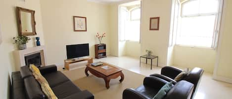 Bright Living Room with Tall Windows