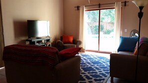 Living Room looking out to the pool.