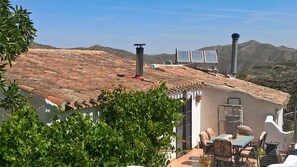 View from the hillside towards the mountains, private terrace to the front