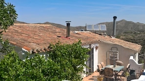 View from the hillside towards the mountains, private terrace to the front