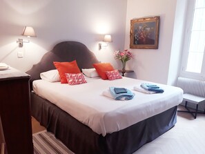 King size bed. Very quiet bedroom overlooking patio.