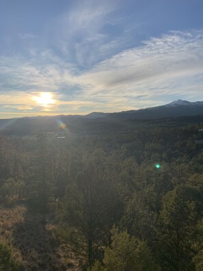 Sun setting over Sierra Blanca.  One of many birds eye views you'll experience!