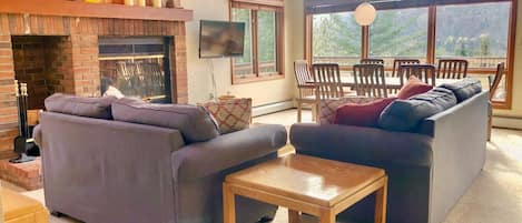 From the open concept dining/living room/kitchen, the ski resort lays open right in front of you.