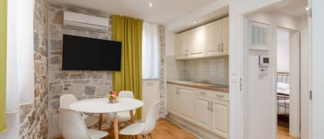 Kitchen, dining area and TV