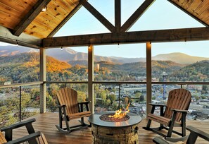 Private covered deck with fire pit from Master bedroom #1