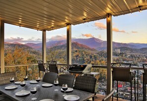 Main floor deck - grill, outdoor dining, bar top seating & million dollar views!