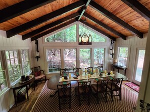 Dining room overlooking a beautiful flowing Branch and Rhodendron forest